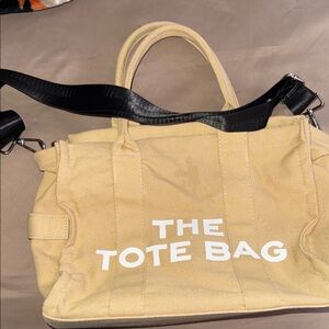 Beige Canvas Tote Bag with Bold White "THE TOTE BAG" Text